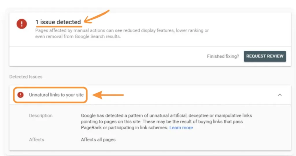 Screenshot of Google Search Console displaying a manual action warning for “unnatural links to your site” with an option to request review.