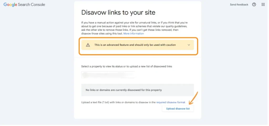Screenshot of Google Search Console Disavow Links tool with a caution warning and upload disavow list button